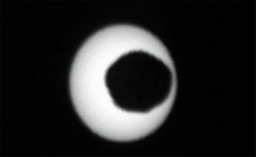 A Solar eclipse as seen from the surface of Mars by the Curiosity rover -- Phobos does not cover the entire Sun.